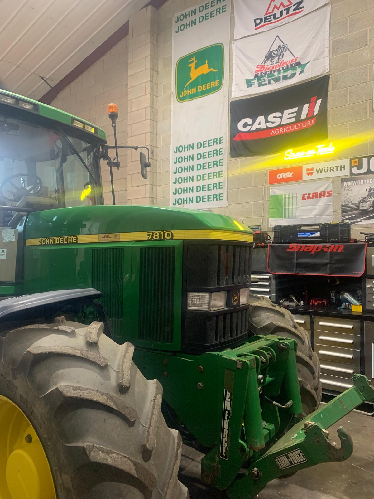John Deere 7810 in workshop